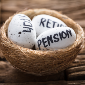 Eggs with the words pension, retire and 401k written on them