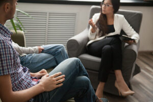 Couple talking with divorce mediator at New Home Divorce Mediation